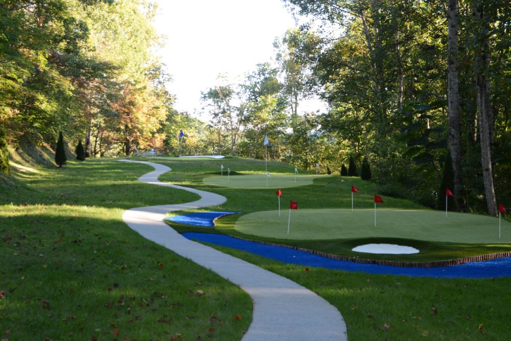 artificial turf used in a short golf course with artificial waterways and artificial cart paths made with turf