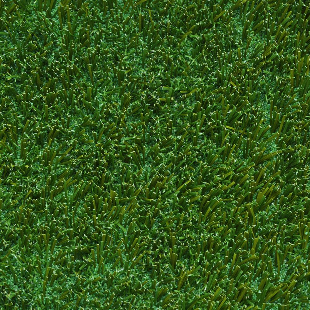 A close up image of artificial green grass. A close up image of artificial green grass.